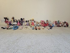 40 Collectable Dolls And Fans