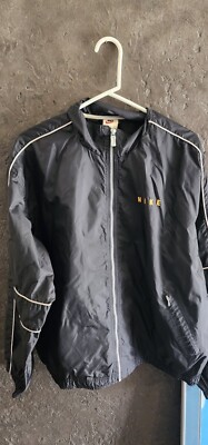 VINTAGE NIKE MENS L Black Track Windbreaker Swoosh Spellout Embroidered. EUC