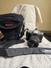 Pentax ZX-7 35mm Camera With strap, case and extension grip for better handling