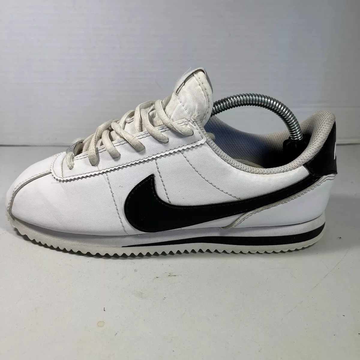 Nike cortez black clearance and white price