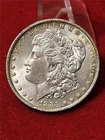 1883-O UNCIRCULATED MORGAN 90% SILVER DOLLAR  ME VS YOU               #T3800