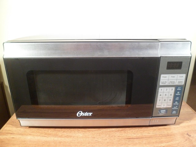 Oster Ogt6701 7 Cubic Ft Stainless Steel Microwave For Sale