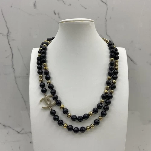Autentica collana lunga con logo Chanel CC B16S GHW nero e perla dorata