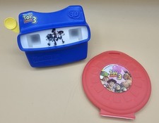 Blue Fisher-Price View-Master 3D Toy Story 3 image reels, and a red storage cas