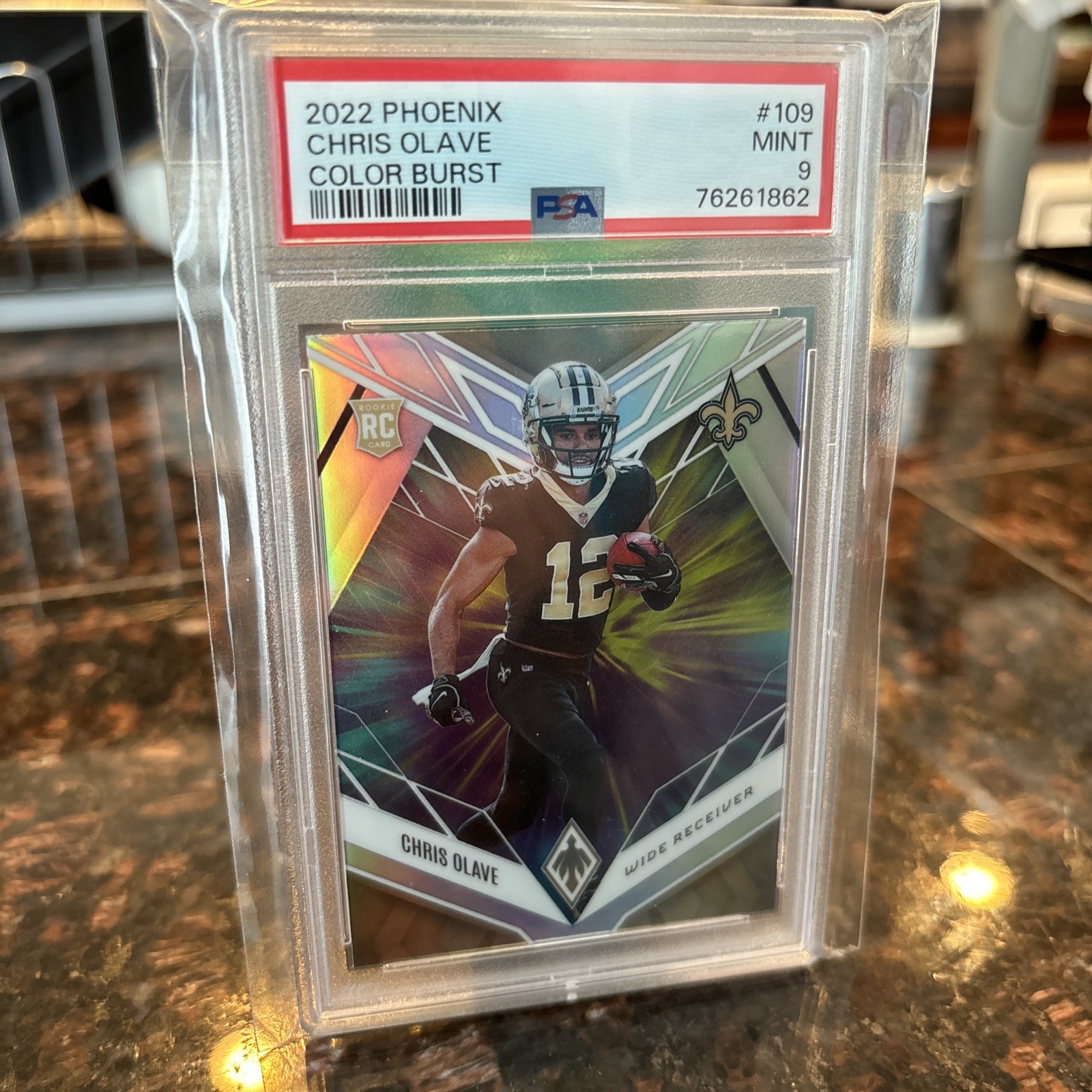 2022 Panini Phoenix - Rookies Chris Olave #109 Color Burst (RC) PSA 9 MINT POP 8