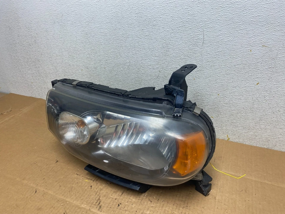 Faro lateral izquierdo halógeno Nissan Cube 2009-2011 OEM N4343 DW Foto 2 de 4