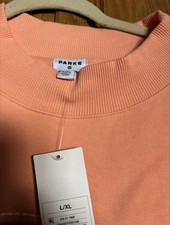 IN HAND NWT Parke x Target Peach Orange Mock Neck L/XL Sweatshirt Pullover.