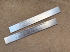 NOS 2008 2009 FORD MUSTANG BULLITT ALUMINUM SCUFF SILL THRESHOLD PLATE EMBLEMS