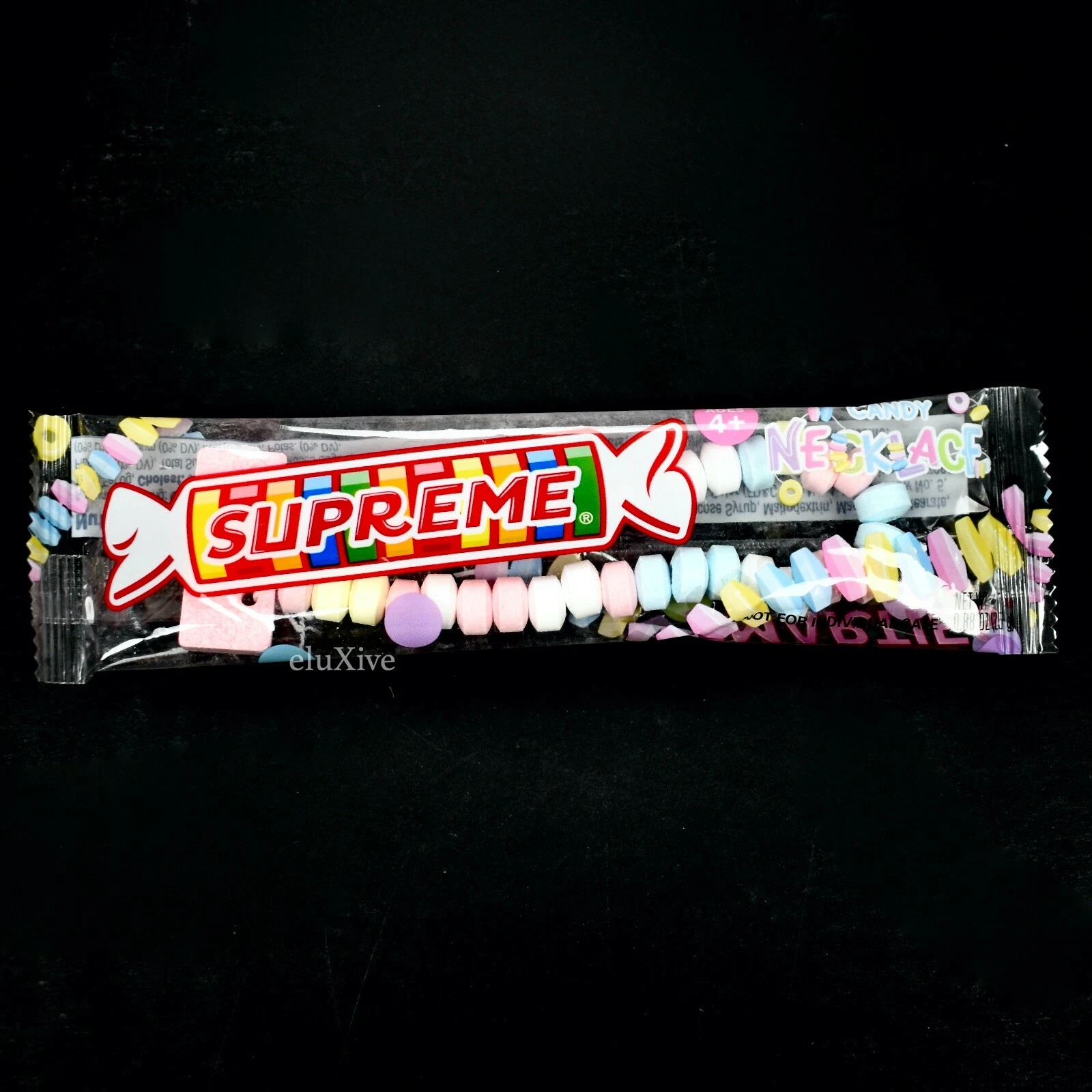 Neuf avec étiquettes boîte Supreme Smarties logo collier bonbons charme bonbons durs DS SS22 AUTHENTIQUE