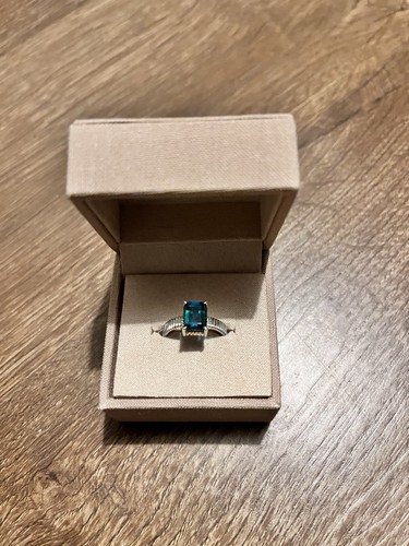 Ella Ring, 14k White Gold. 8.5x6.5mm Emerald cut Zambian Emerald. FingerSize 5.5