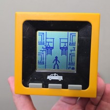 Radica Cube World Block Bash Big City Handheld Stick People Working