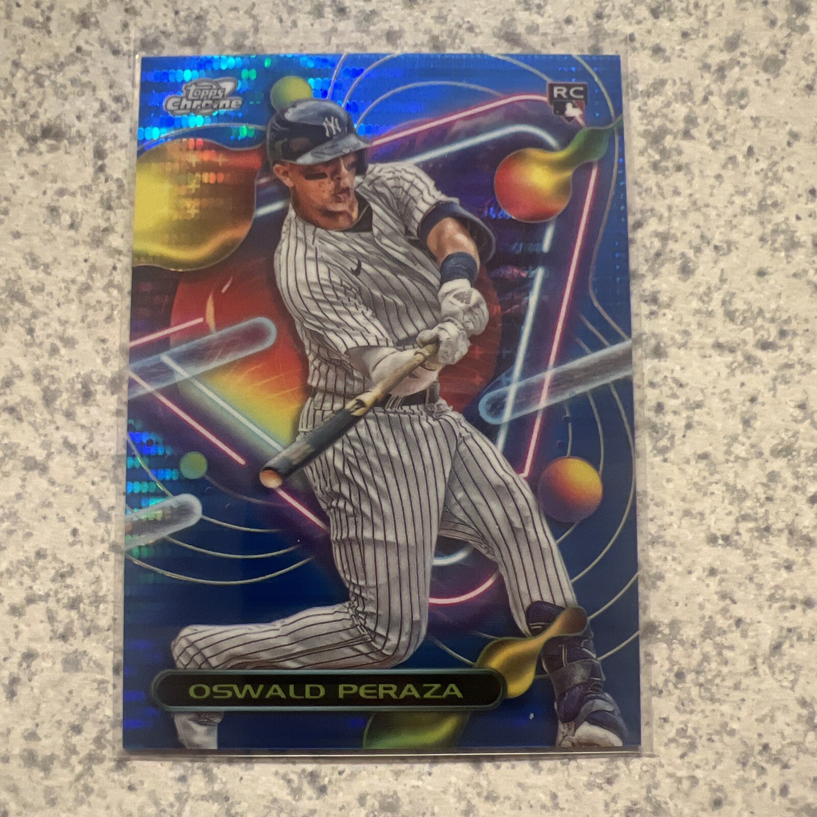 2023 Topps Cosmic Chrome Oswald Peraza #84 Blue Moon Rookie Refractor /99