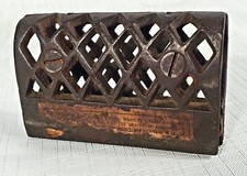 antique ice skate blade sharpener pierced iron work 1800's partial paper label