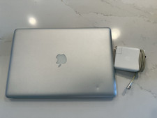 Apple MacBook Pro A1286, 15-inch For Parts/Repair with OEM charger bundle