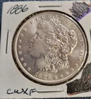 1886 MORGAN SILVER DOLLAR -- CWXF -- CHOICE XTRA FINE