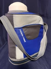Ozark Trail 1 Gallon Insulated Water Jug in a blue and gray carrier.