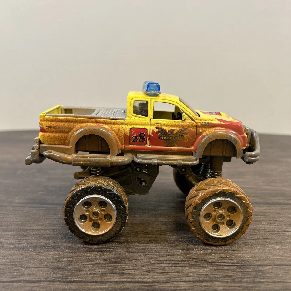 Dickie Toys Fire Eagle Rally Monster Truck Diecast Pull Back & Go 15 cms de largo Foto 2 de 4