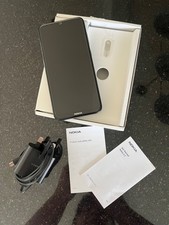 Nokia 2.3 charcoal mobile phone, charger and manual, in VGC.