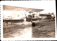 VTG Snapshot Photo Antique Biplane Next to Passenger Plane
