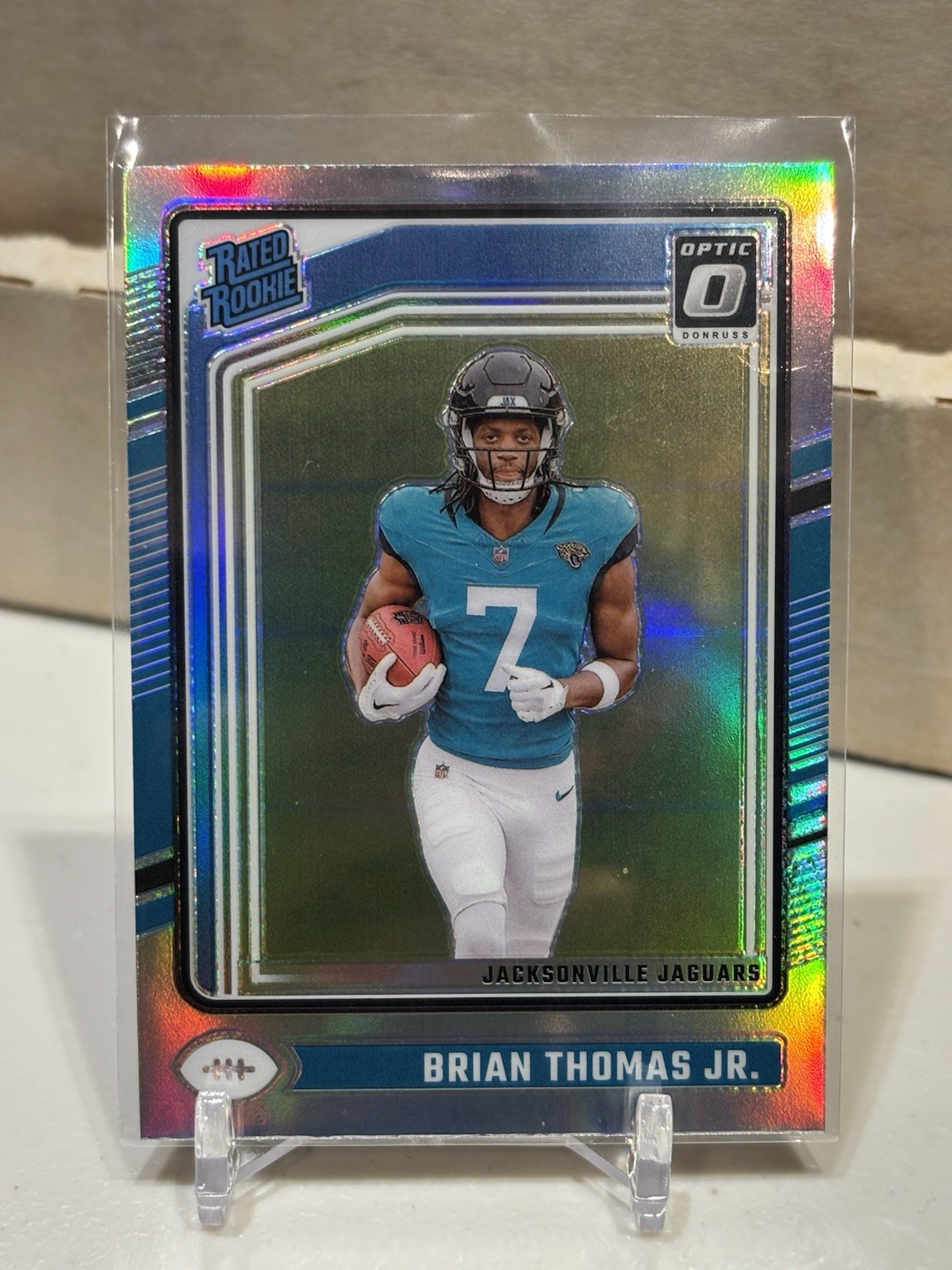 2024 Donruss Optic #214 Brian Thomas Jr. Rated Rookie Holo Prizm (SURFACE FLAW)