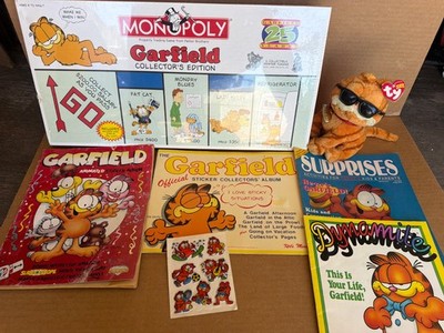 Vintage Garfield collection with monopoly , TY beanie baby , and magazines