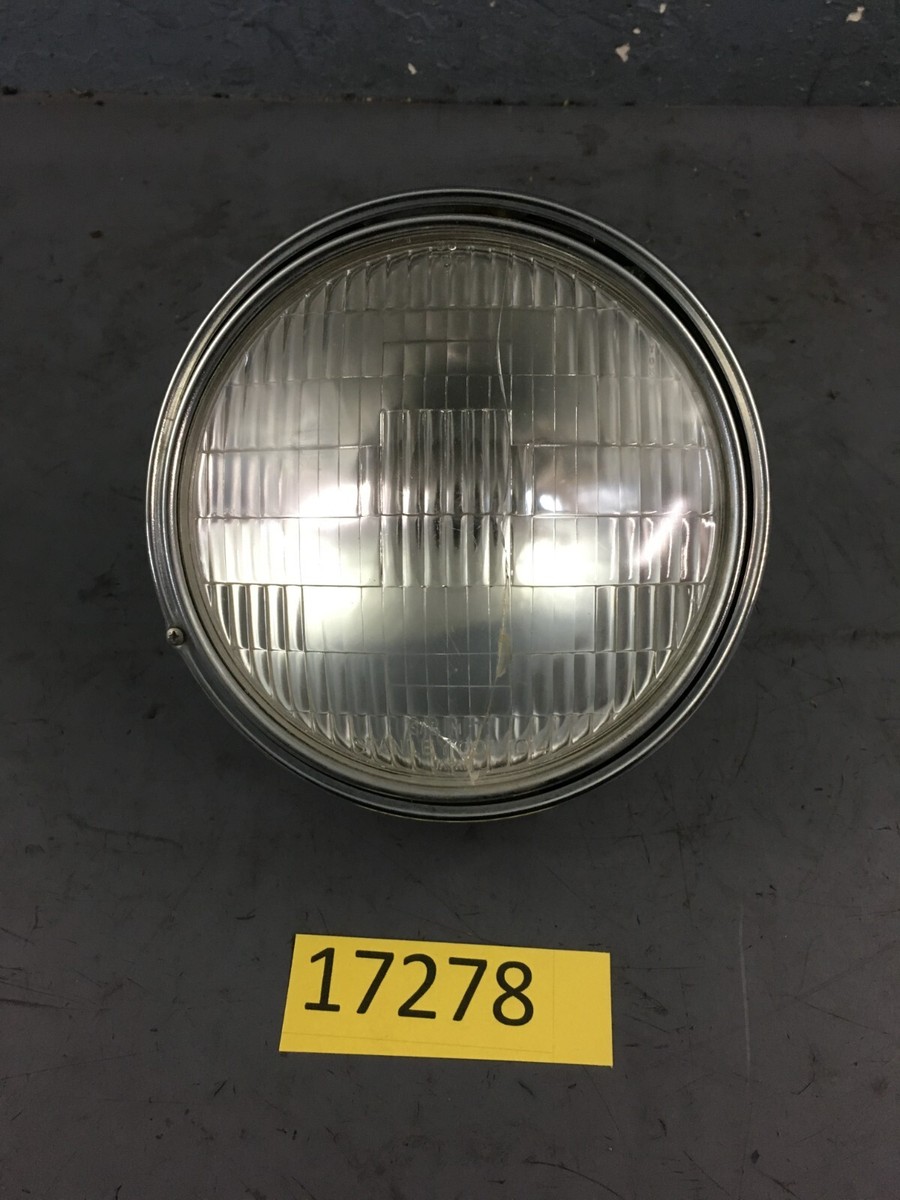 70's 80's Suzuki GS750 Headlight and Bucket and Trim Ring NICE oem