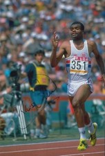 KRIS AKABUSI HAND SIGNED 12X8 PHOTO OLYMPICS AUTOGRAPH LOS ANGELES 1984 7