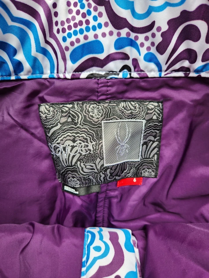 Pantalones de esquí/snowboard Spyder juveniles blancos/color salpicaduras forrados aislantes talla 6 usados en excelente estado Foto 3 de 4