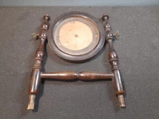 primitive torso of an old wooden mirror