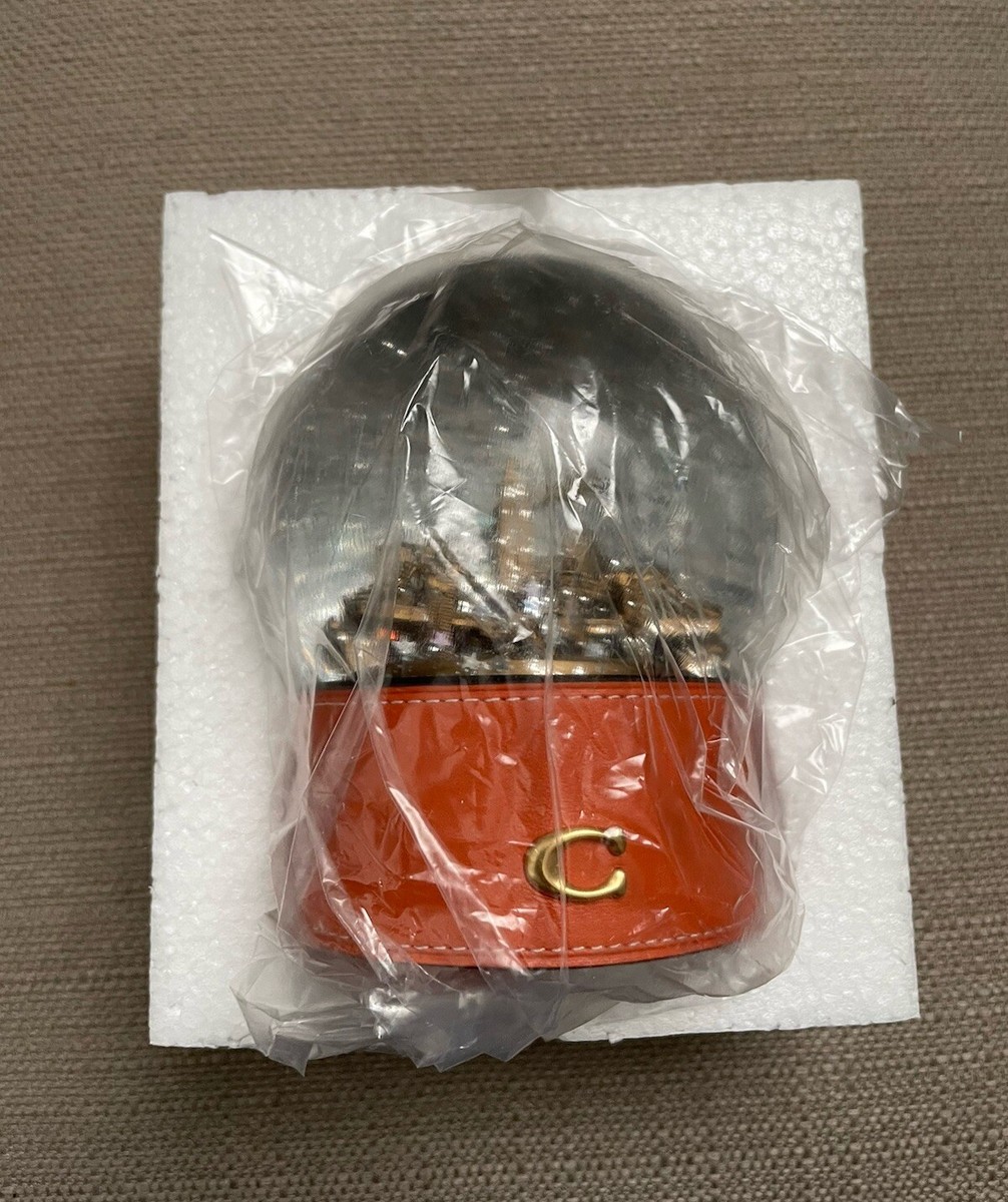 Coach Snow Globe With Rexy And Snowman in Colour Brass