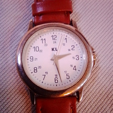 KL Unisex Quartz Analog Wristwatch White Dial Arabic 24-Hour Leather