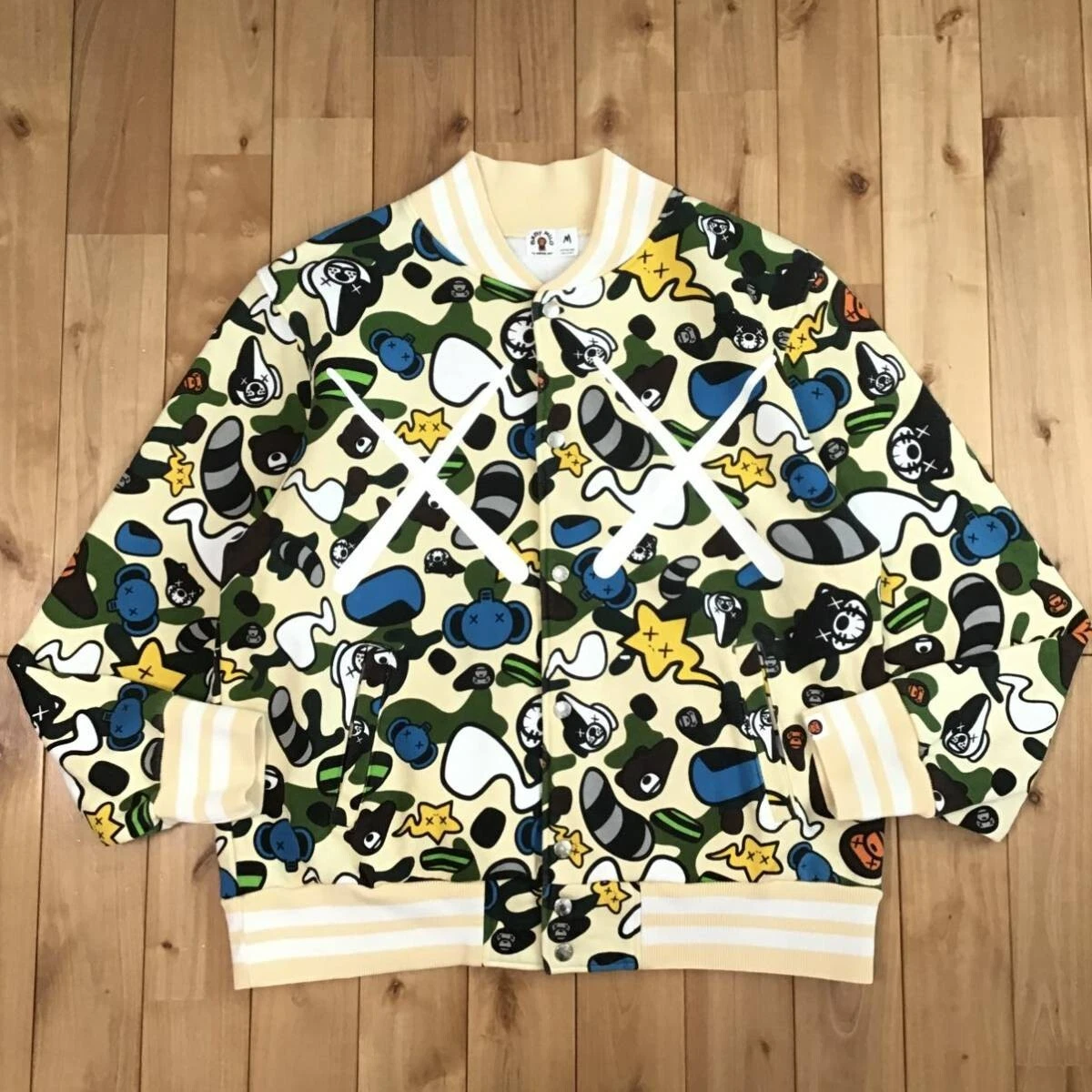 BAPE × KAWS Milo Animal Kingdom sweat varsity jacket A Bathing Ape
