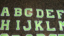 Green letters iron or sew on patch 2 in tall white border alphabet lime green