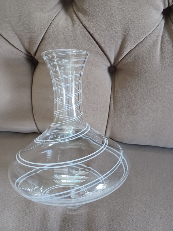 2 crystal decanters ,1 handblown Kekic rolling decanter and 1 etched decanter.