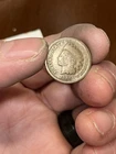 This is an 1865 Indian Head cent Good Condition Worth $8