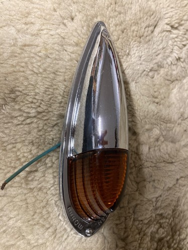 Arrow #39 NOS cab, marker clearance light, chrome cover, w/amber glass lens