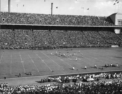 on-field action between Ohio State University University Iowa duri- Old Photo