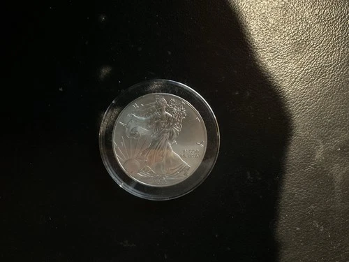 2012 AMERICAN SILVER EAGLE   BU  IN CAPSULE   1 OUNCE   .999 FINE