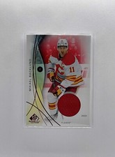 2024-25 SP Game Used - Red Jersey MIKAEL BACKLUND #85- Calgary Flames