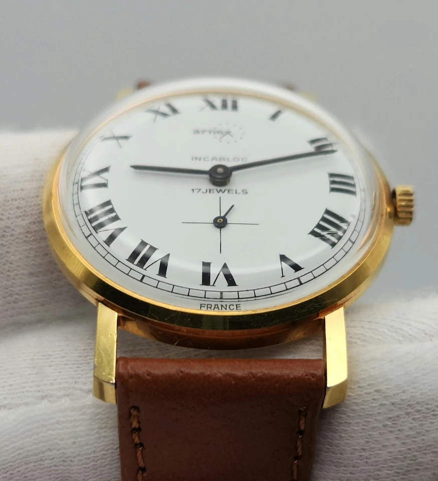 Reloj mecánico Arnex vintage para hombre tono dorado con esfera blanca y números romanos Foto 4 de 4