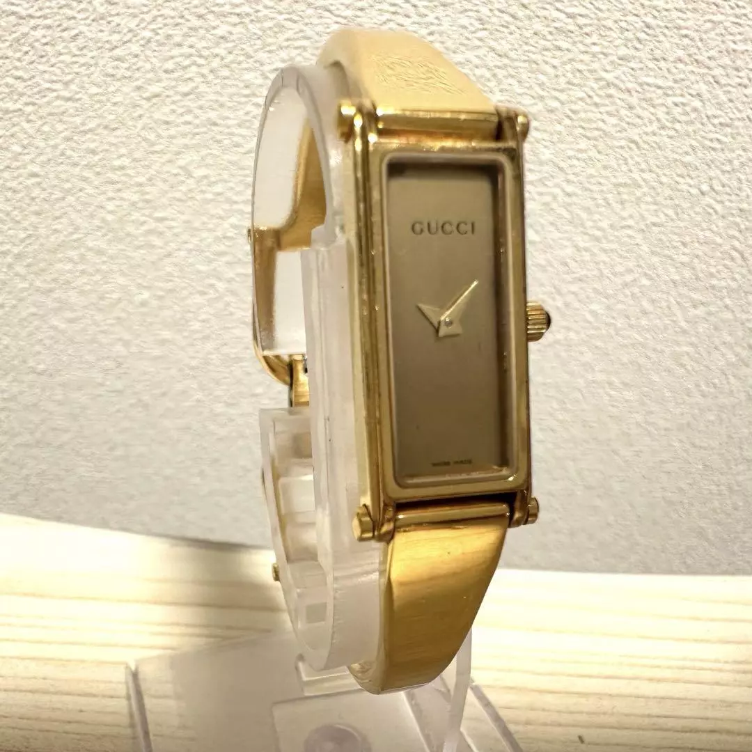 Montre femme vintage JAPON F/S cadran doré quartz 1500L neuve GUCCI objet fonctionnel