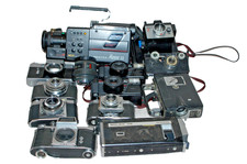 lot of vintage diferent kind of cameras and camera Corders