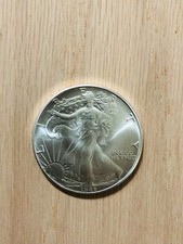 1986 American Eagle silver coin UNCIRCULATED, taken out from orignal roll.