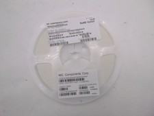Roll of 10000 NIC Components Corp. NMC0402NPO221F50TRPF Ceramic Caps