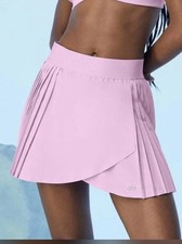 Alo Yoga NWT Women  s Aces Tennis Skirt - Sugarplum Pink 100 Authentic
