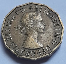 1955 Queen Elizabeth II Brass Three Pence Coin With Good Detail Remaining.