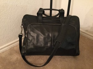 black leather garment bolsa