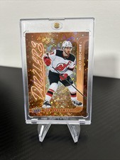 2024-25 Upper Deck Series 2 Nico Hischier Dazzlers Orange #DZ-65 Devils