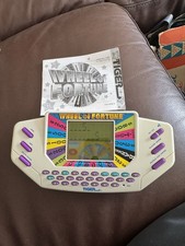 Wheel Of Fortune Handheld Electronic Game by Tiger Electronics 1995 Tested Works