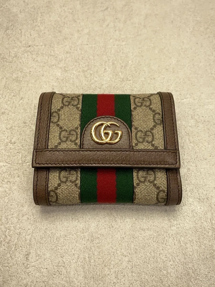 Portefeuille femme GUCCI 3 plis GG Supreme PVC beige motif total occasion